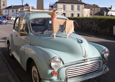 DOG on the bonnet of a Morris 1000